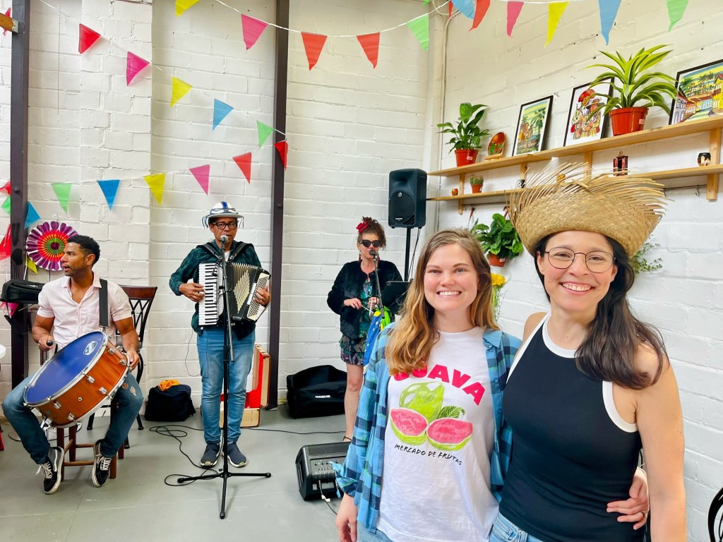 Berkeley Organic Market owners standing with Brazilian music.